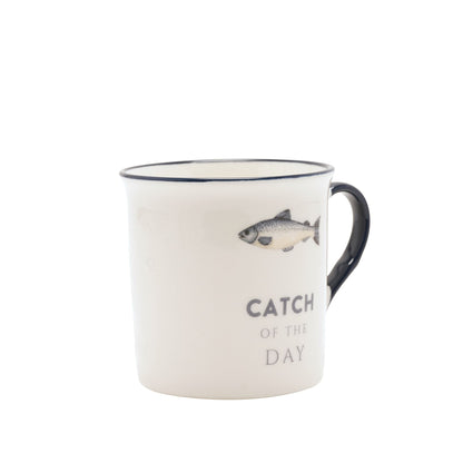 White fishing mug with blue rim, fish graphic, and 'CATCH OF THE DAY' on side