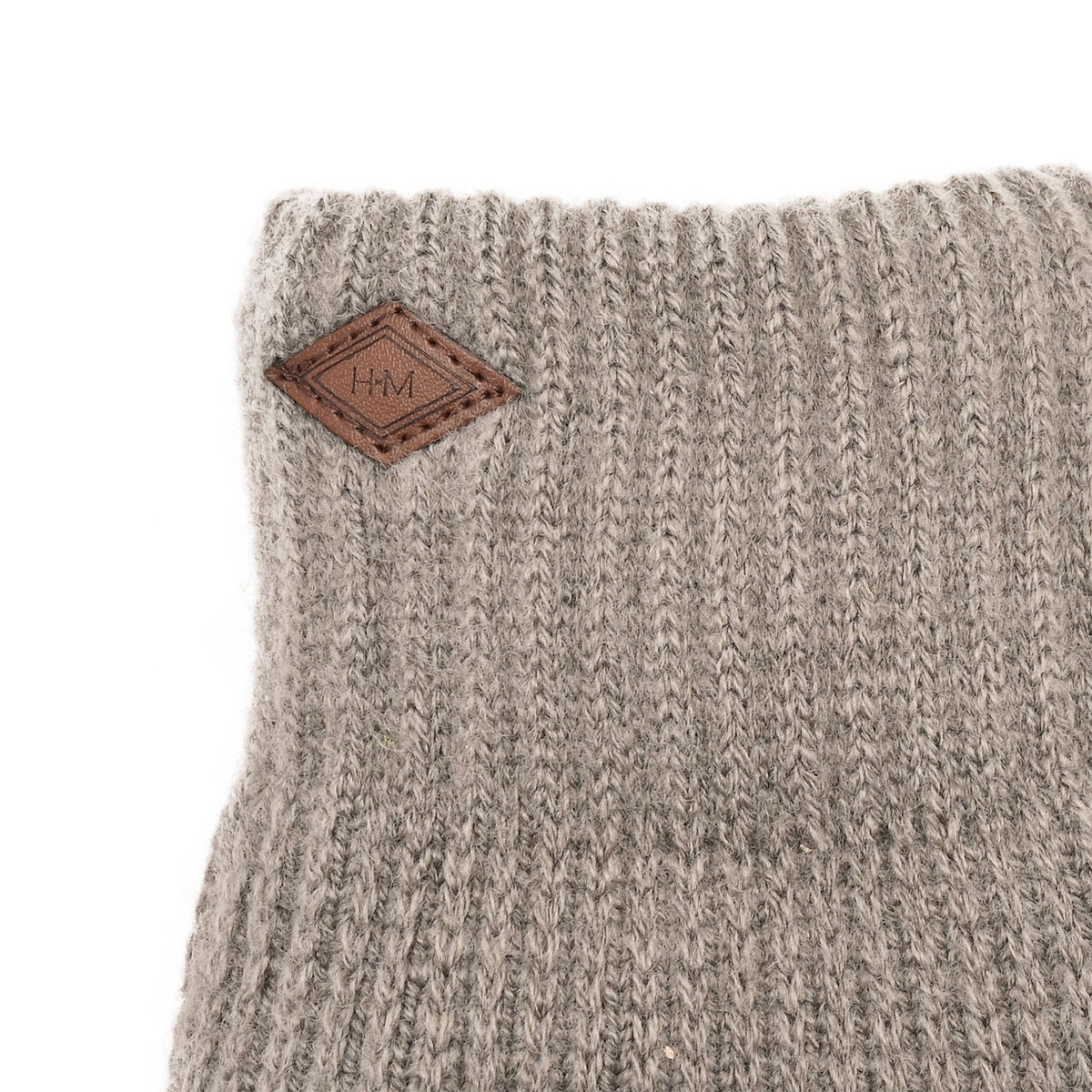 Grey knit glove cuff with leather logo patch detail