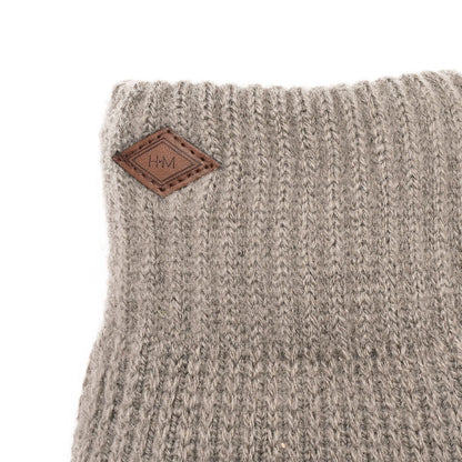 Grey knit glove cuff with leather logo patch detail