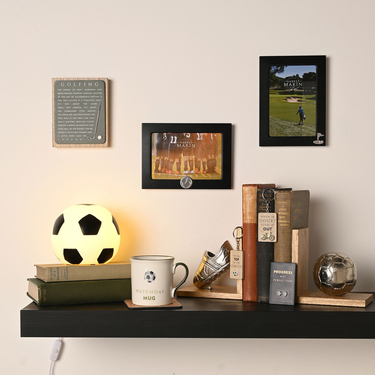 Small black 6x4 football photo frame with clear window and soccer ball emblem