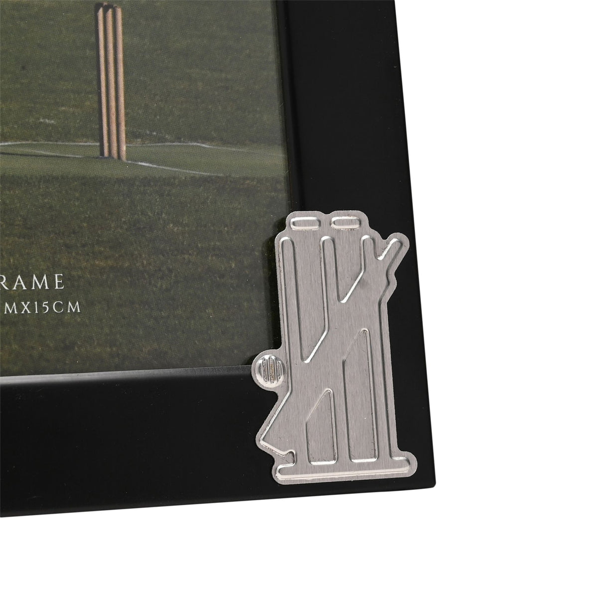Close-up of black 4 x 6 photo frame with cricket bat and wickets metal charm