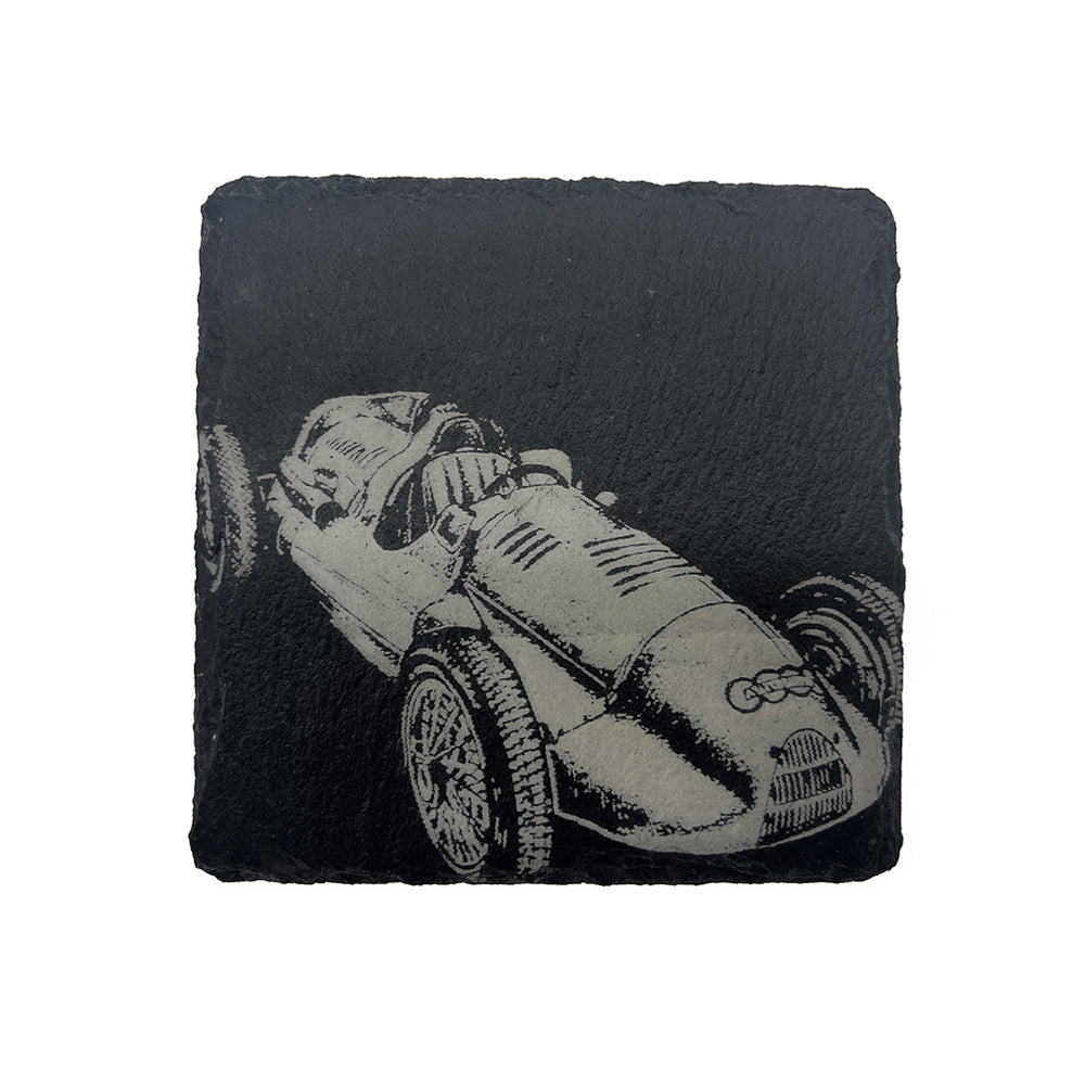 Slate coaster with a racing car design on a white background
