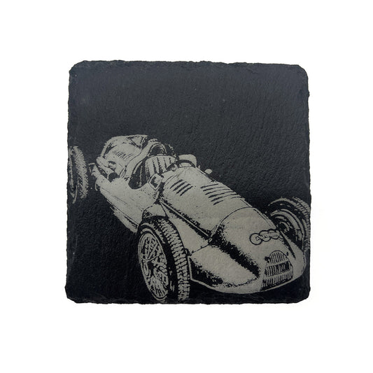 Slate coaster with a racing car design on a white background
