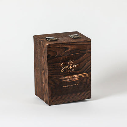 Wooden presentation box with metal latch and Selbrae House logo for drinks set
