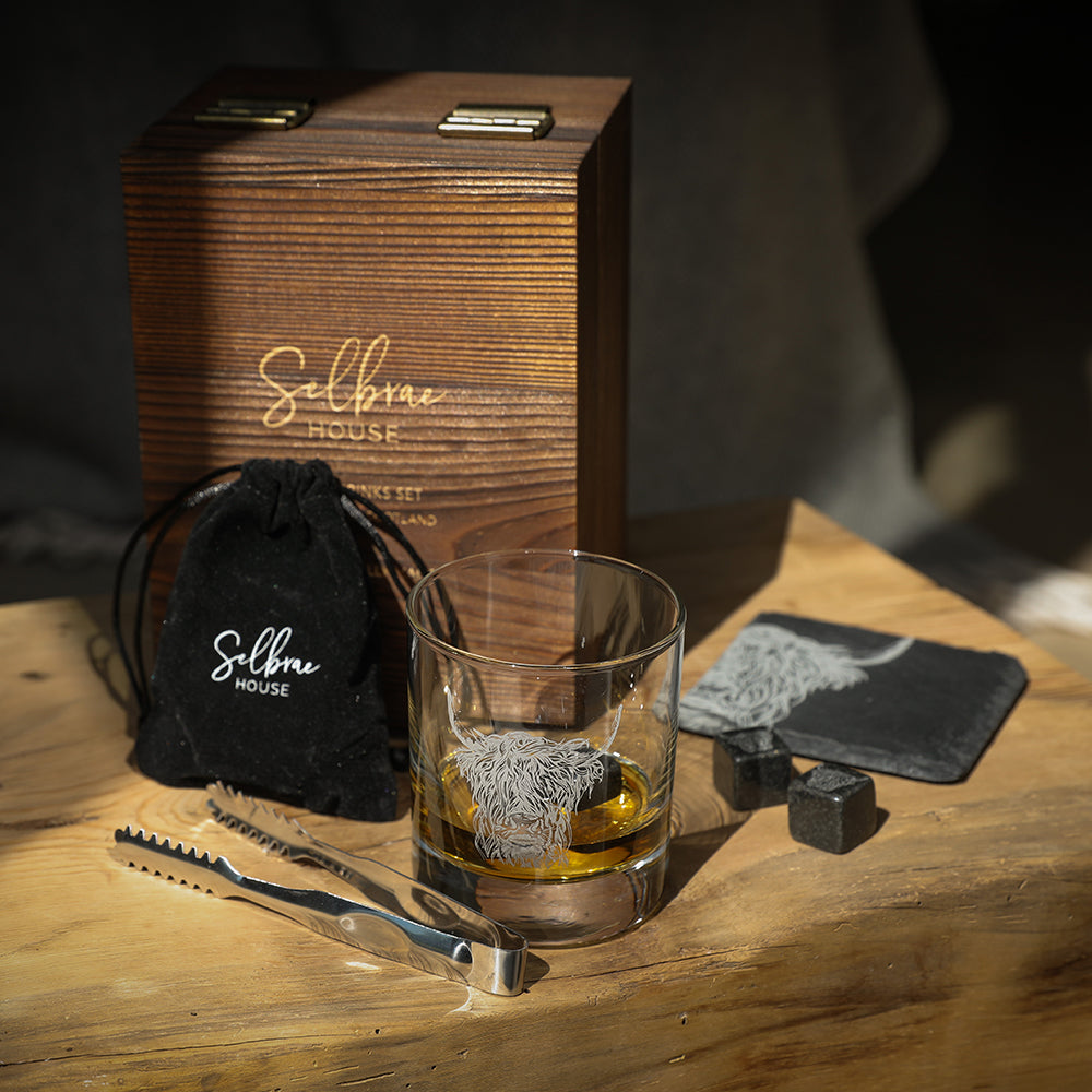 Wooden Highland cow drinks set with engraved glass, black pouch, and accessories