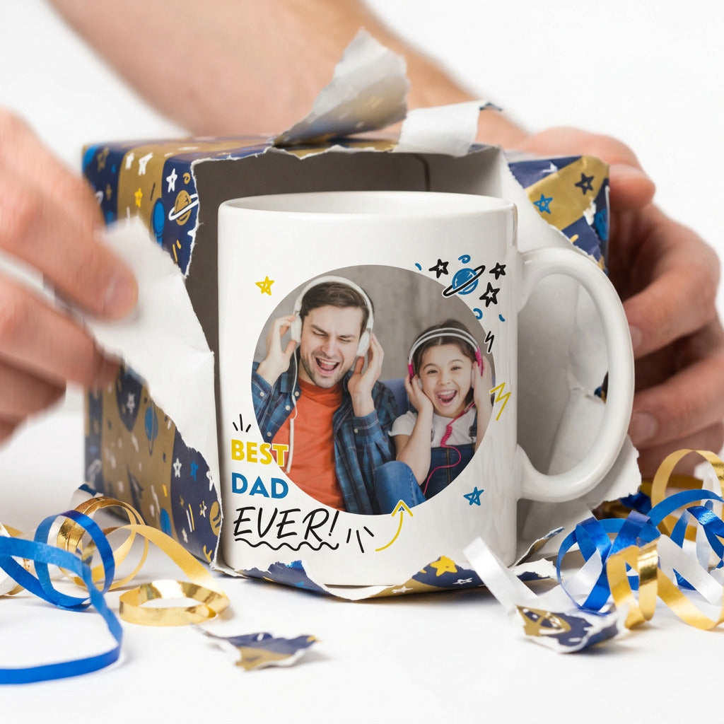 White mug with a photo of a man and a child, text 'Best Dad Ever!', and decorative elements on a white background.