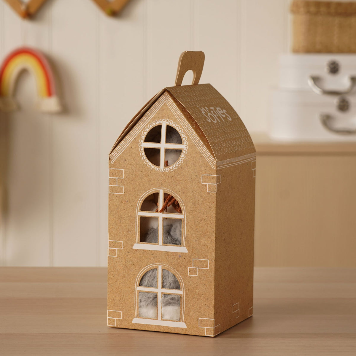 Decorative house display box with window cutouts and glitter-style trim