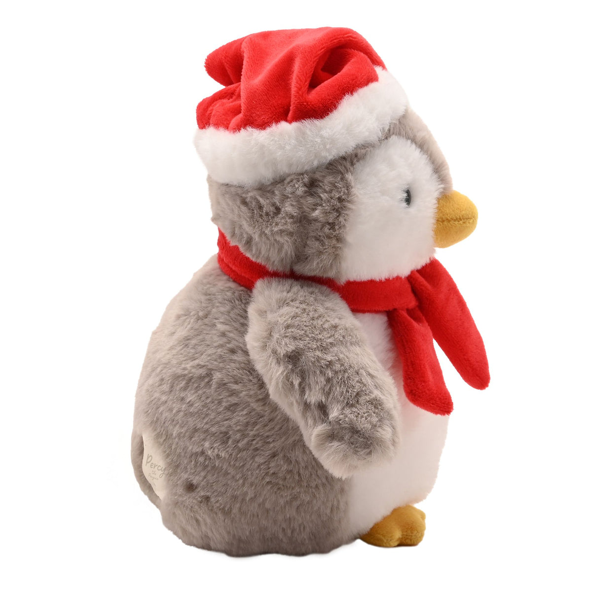 Side view plush penguin with red Santa hat and scarf, grey body, yellow beak and feet