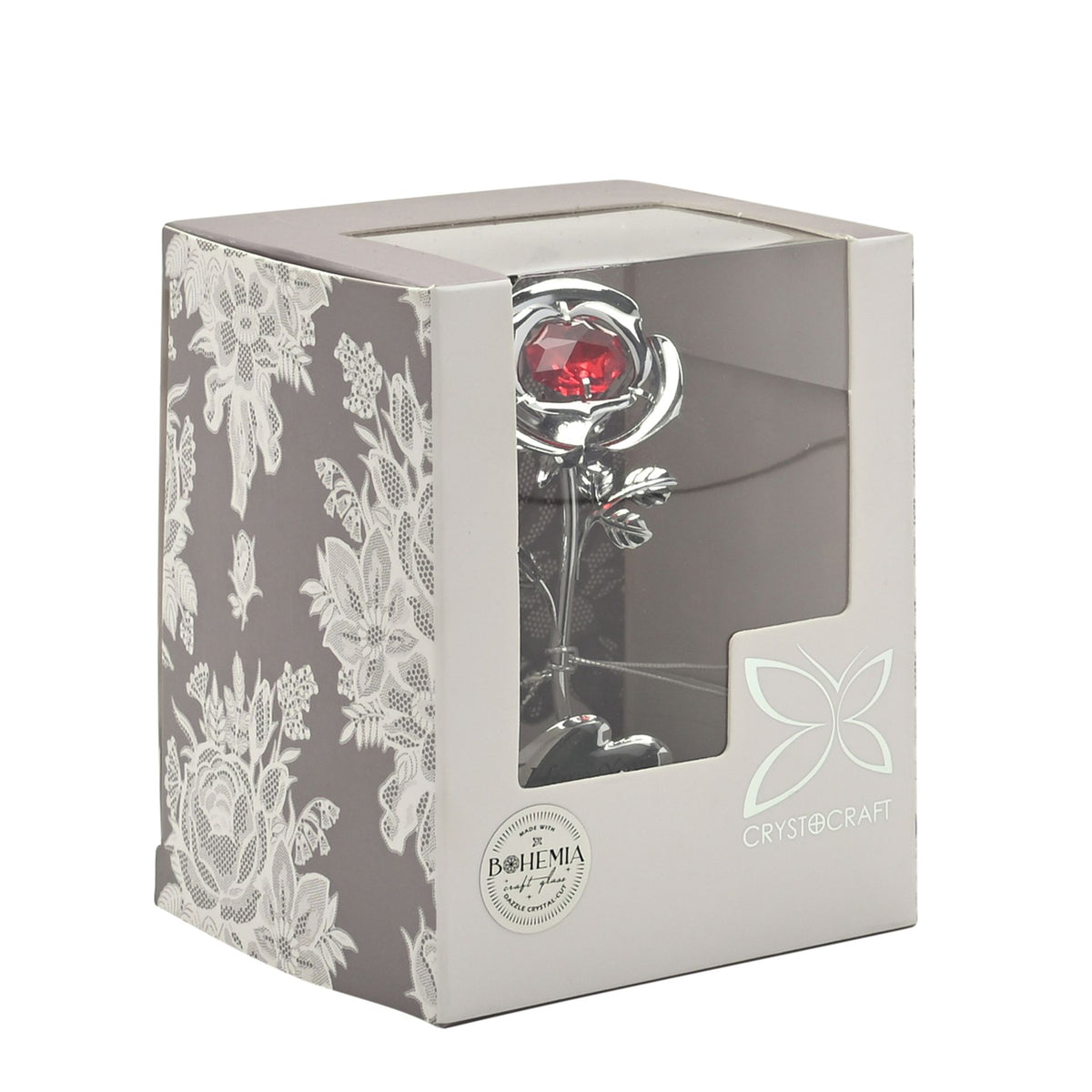 Gift box with window showing silver rose ornament and red crystal heart