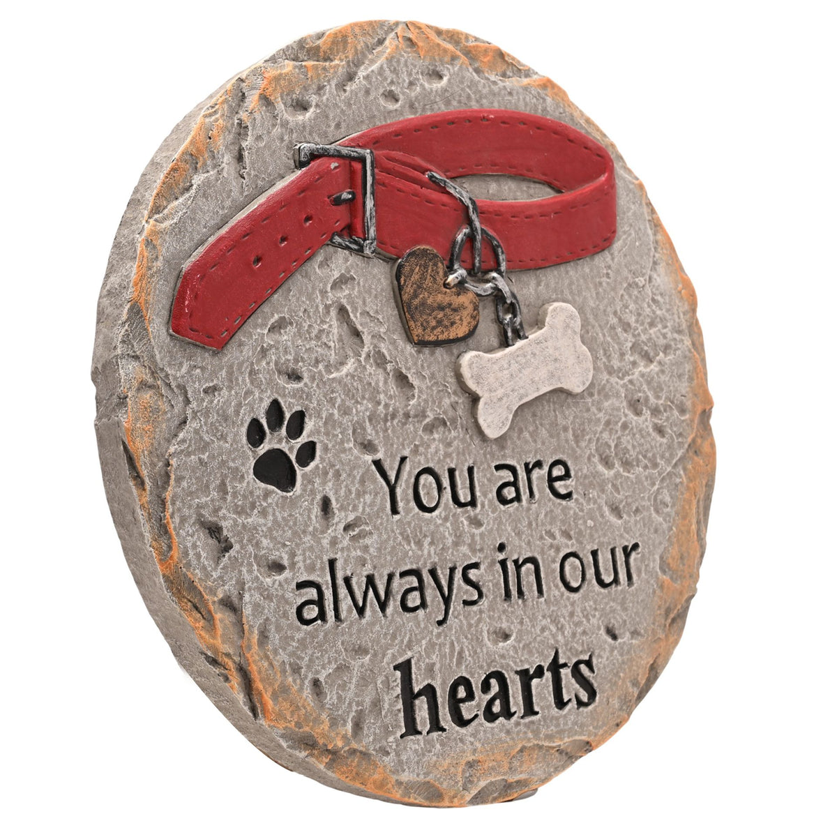 Pet memorial stone with red collar, heart tag, paw print, bone charm, “You are always in our hearts”.
