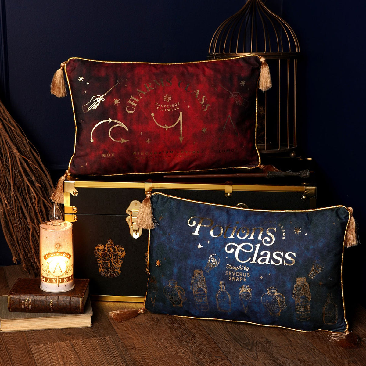 Velvet Potions Class cushion with gold trim and tassel ends, potion bottle print on blue