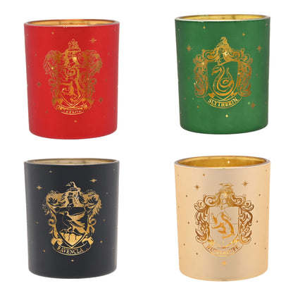 Set of 4 tealight holders in red, green, dark gray, and cream with house crest emblems