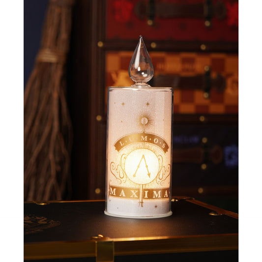 LED cylinder candle with flame cap, pale pink with gold Lumos and Maxima emblem
