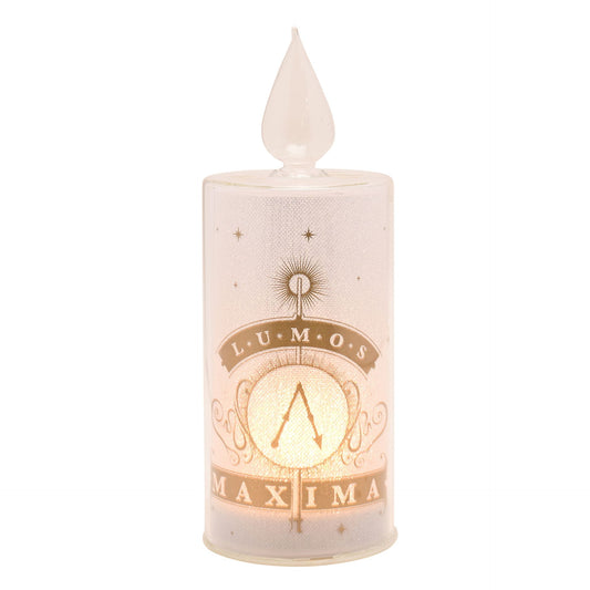 LED cylinder candle, pale pink with gold Lumos text and Maxima band, flame top