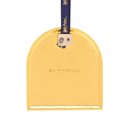 Metal hanging ornament back with dark blue ribbon and small attachment label