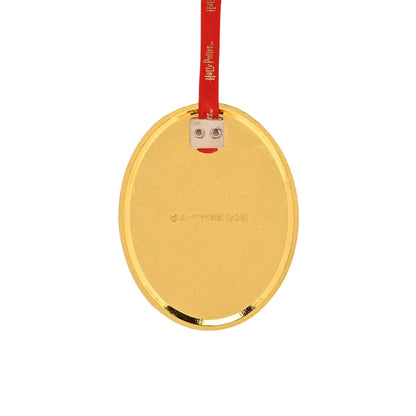 Back of oval Privet Drive ornament in gold tone with metal clasp and red ribbon