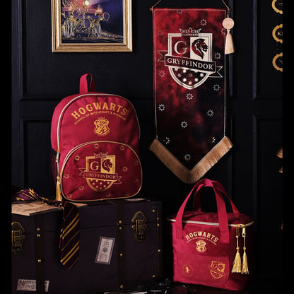 Gryffindor hanging banner with shield crest and star pattern, tan tassel fringe