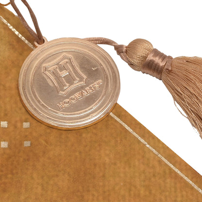 Close-up of Hufflepuff hanging banner crest seal and rope tie with tassel