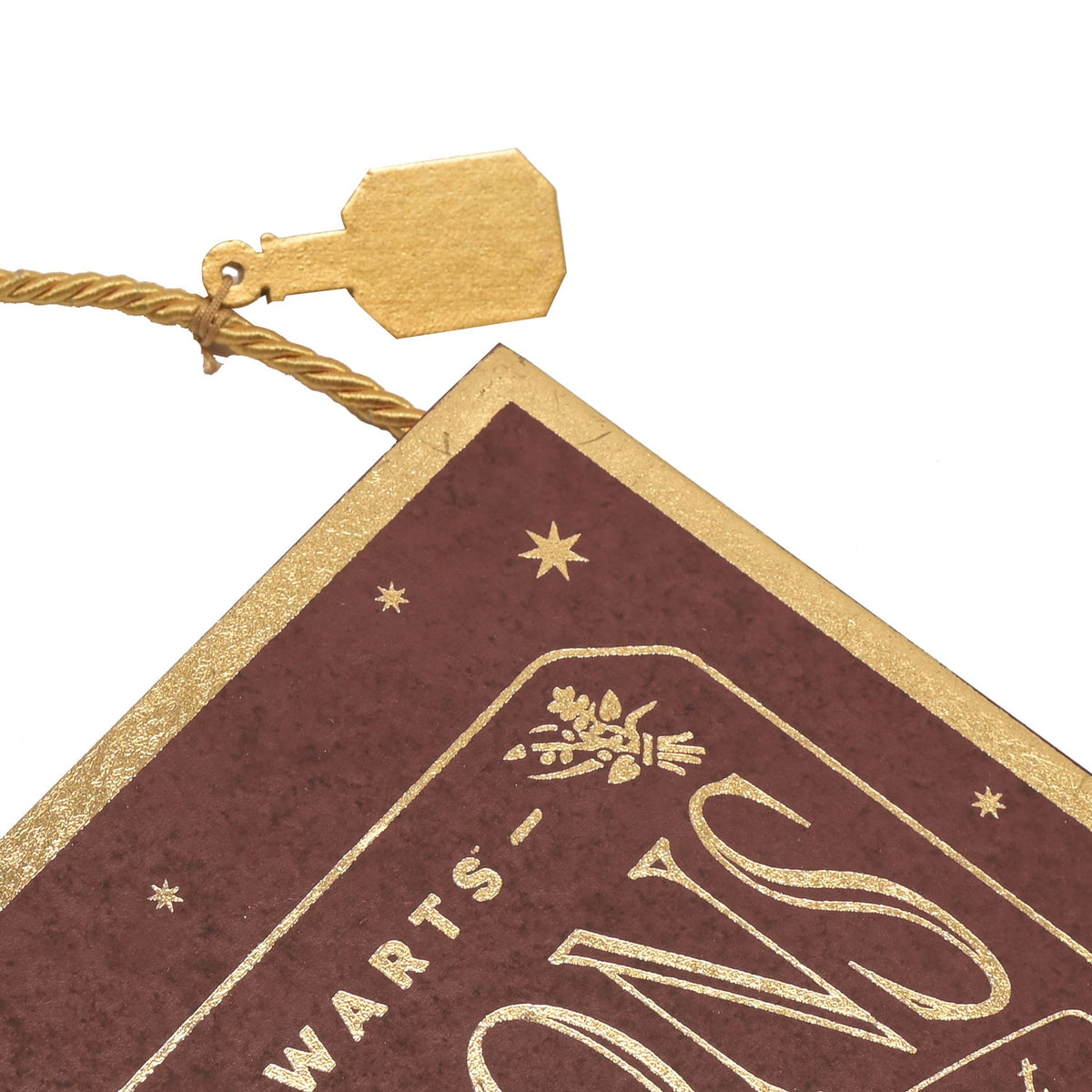 Maroon Hogwarts potion pendant corner with gold text and star emblem, tied tassel