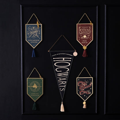 Framed display with multiple Hogwarts potion banner pendants and hanging tassels