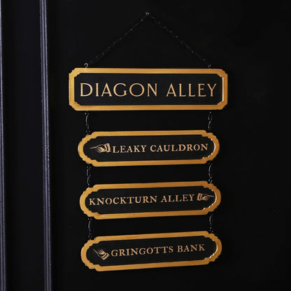 Gold-lettered hanging wooden signs: Diagon Alley, Leaky Cauldron, Knockturn Alley, Gringotts