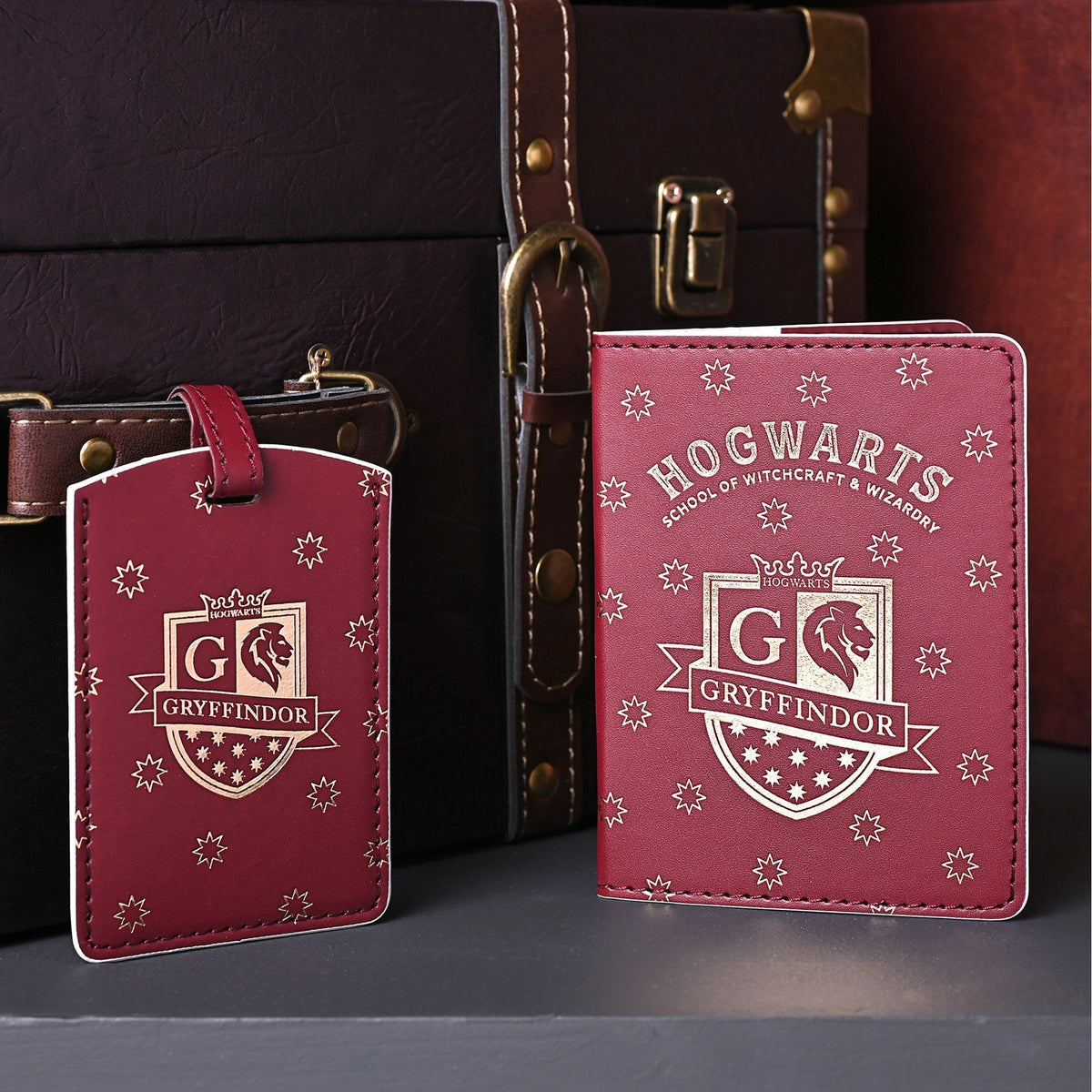 Burgundy Gryffindor passport holder and luggage tag set with Hogwarts crest