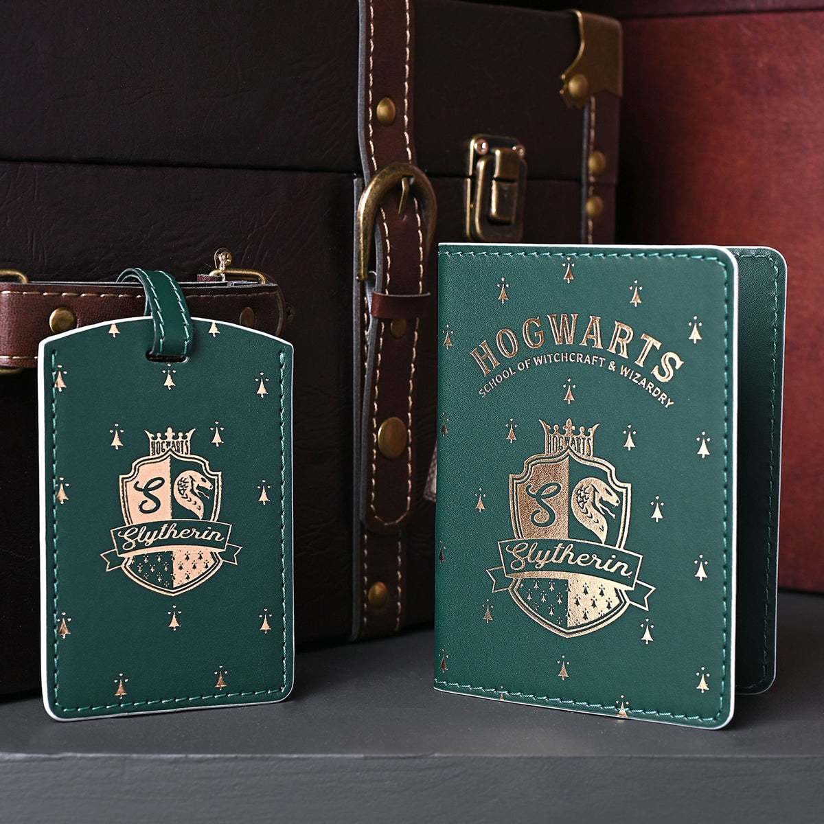 Slytherin passport holder and luggage tag in green with gold Hogwarts crest