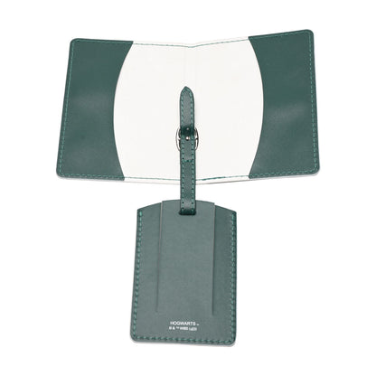 Slytherin passport holder with white insert and green luggage tag with Hogwarts text