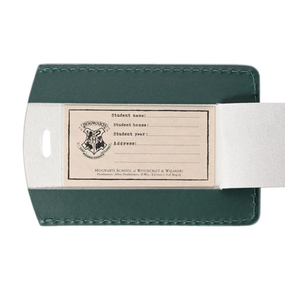 Slytherin passport holder open with label fields for name, house, year, and address