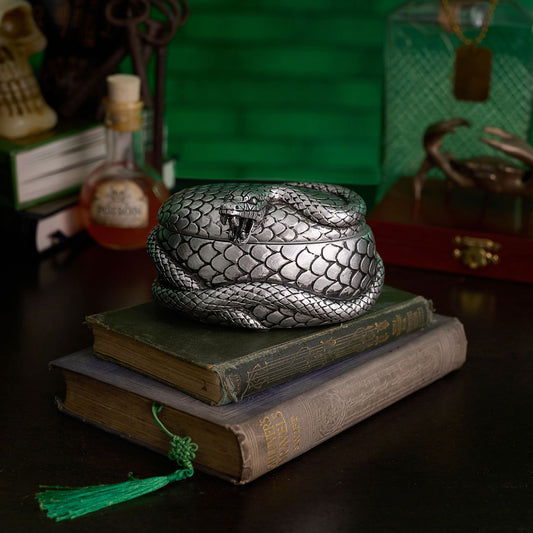 Coiled snake-scale trinket box with hinged lid, metallic silver and dark details