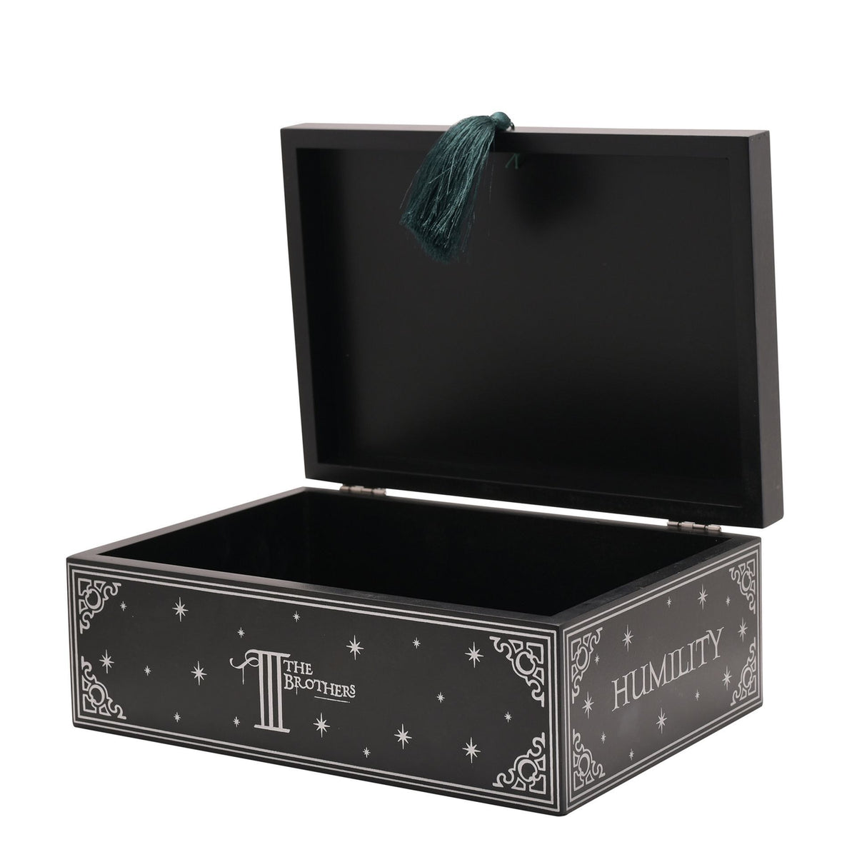 Open black box with teal tassel pull and star-pattern “Humility” side text