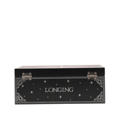 Flat black keepsake box with white star pattern and “Longing” label