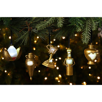 Multiple hanging potion bottle LED ornaments on a Christmas tree branch