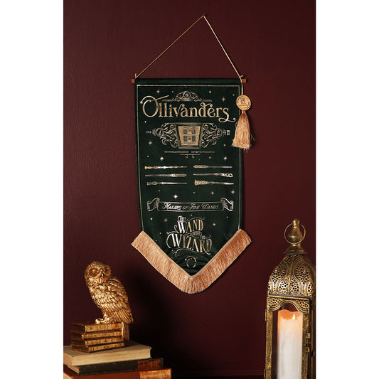 Ollivanders hanging banner on dark green fabric with wand-wizard print and beige tassels
