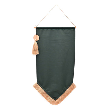 Dark green hanging banner with gold trim and beige tassel on a looped cord