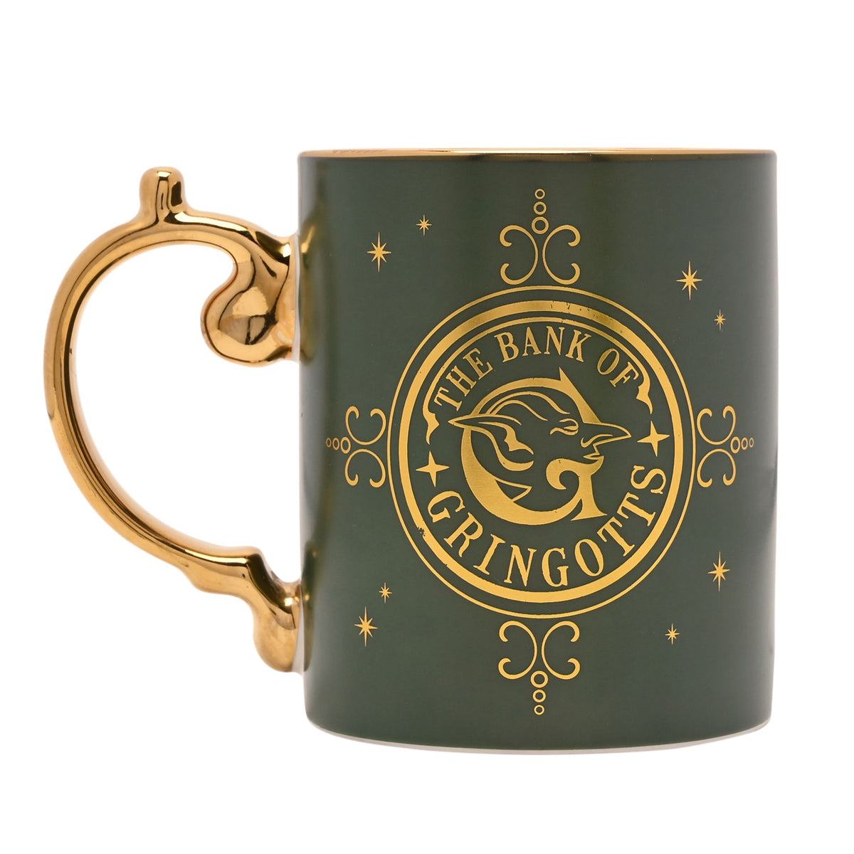 Dark green collectible mug with gold circular Bank of Gringotts emblem and star accents
