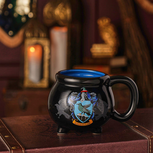 Black cauldron-style mug with blue interior and Ravenclaw house crest