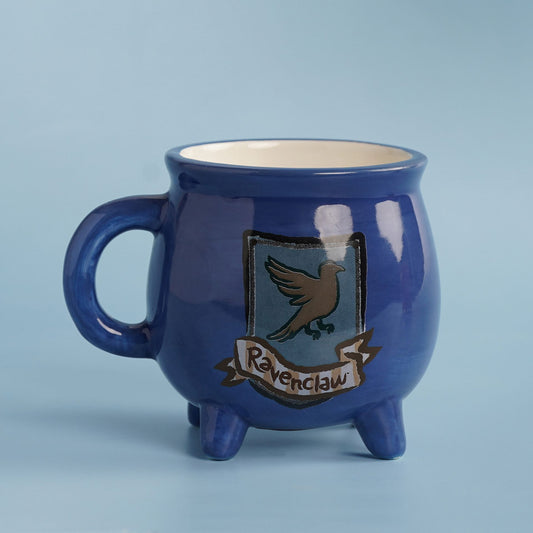 Ravenclaw cauldron-style ceramic mug, deep blue with three legs and bird crest