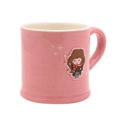 Pink ceramic mug with character and small star accents, angled side view