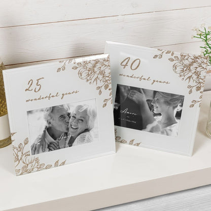 Two pale grey 6x4 photo frames with gold floral designs and anniversary photos