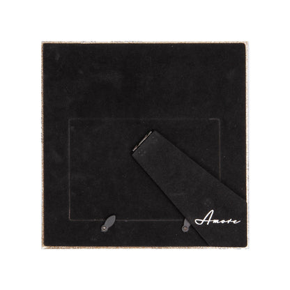 Back of pale grey glass photo frame with “Amore” and hanging hardware