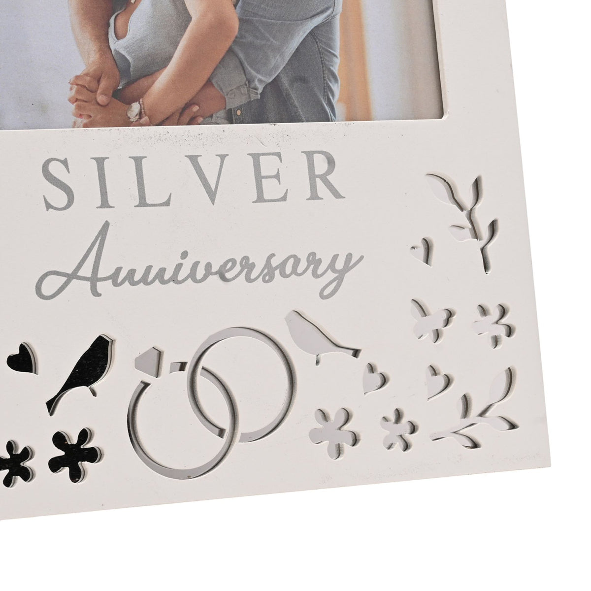 Silver anniversary photo frame detail with “Silver Anniversary” text and heart doves