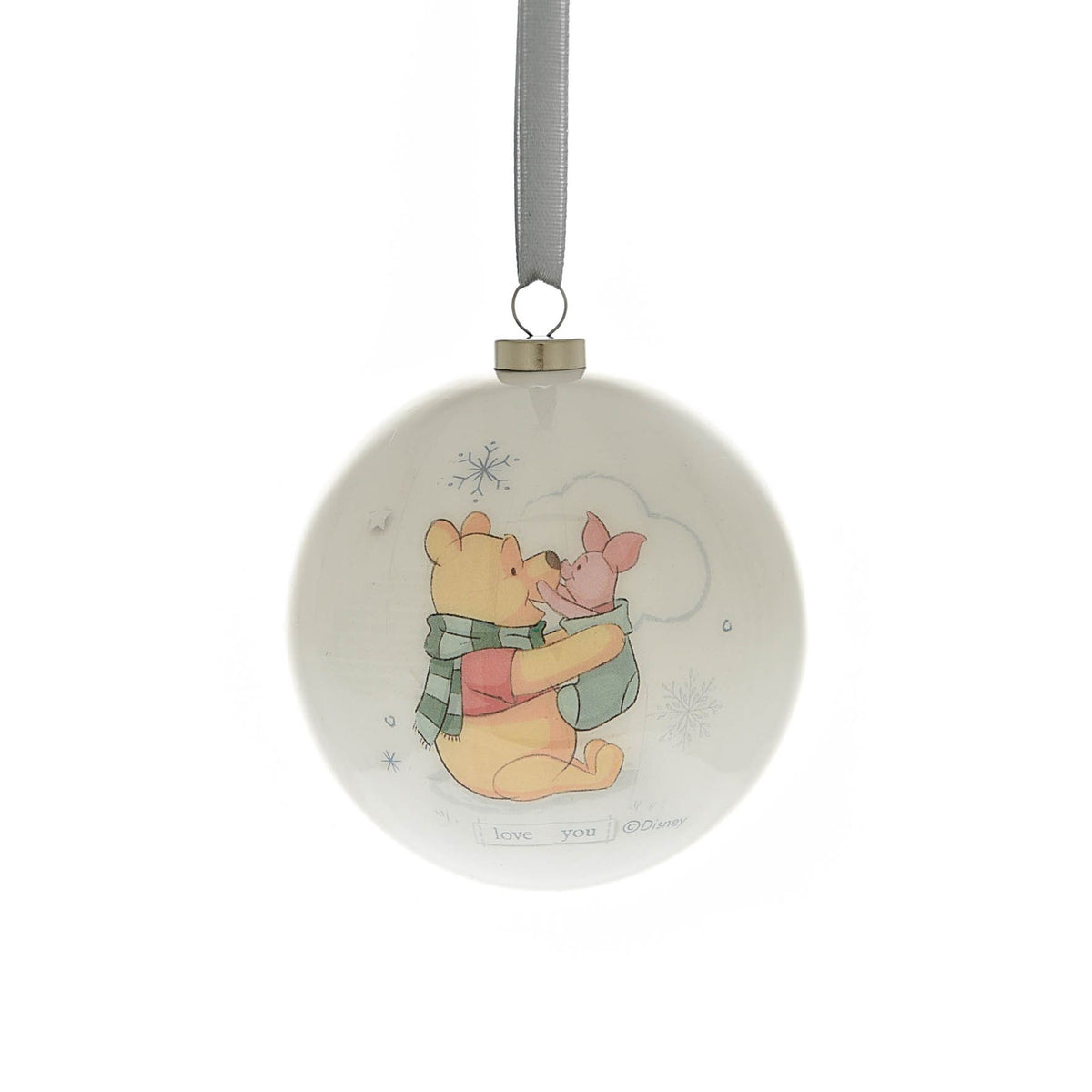 Round Christmas bauble with a bear and pink character hugging illustration, snowflake details