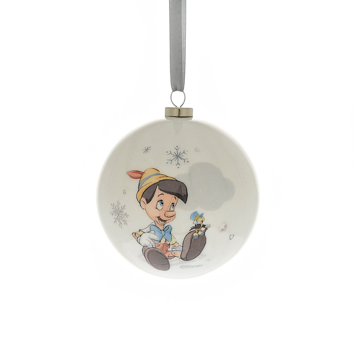 Round Christmas bauble with a child character holding a small toy, surrounded by snowflakes
