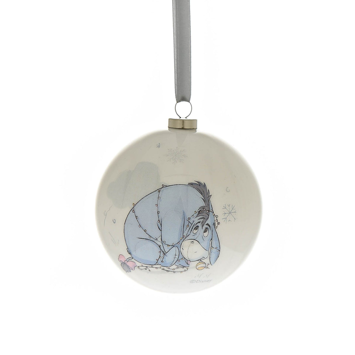 Round Christmas bauble with a blue animal character curled up illustration with tiny stars