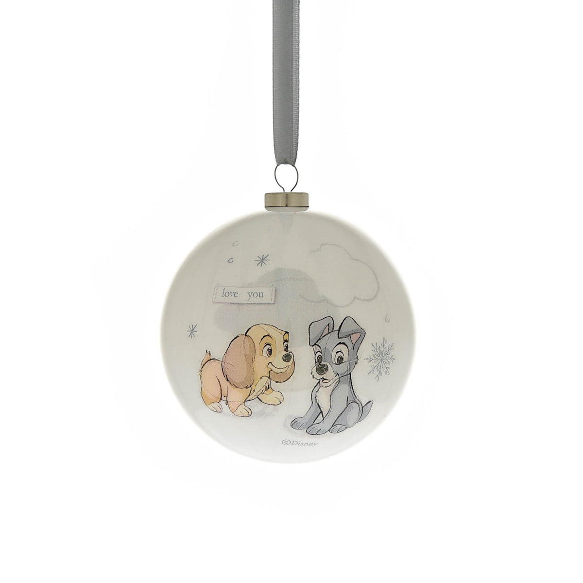 Round Christmas bauble with two animal characters sitting together, with small snowflake marks