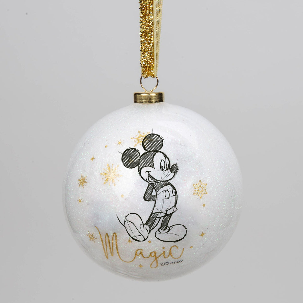 White acrylic glitter bauble with Mickey Mouse sketch and gold text, hanging from gold ribbon