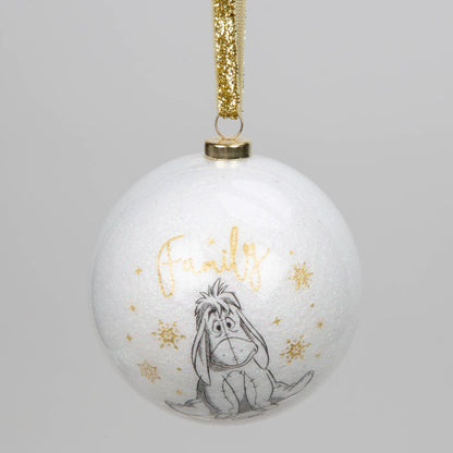 White acrylic glitter bauble with Eeyore and gold text, hanging from gold ribbon