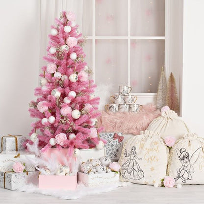 Pink Christmas tree with white hanging baubles and gift boxes