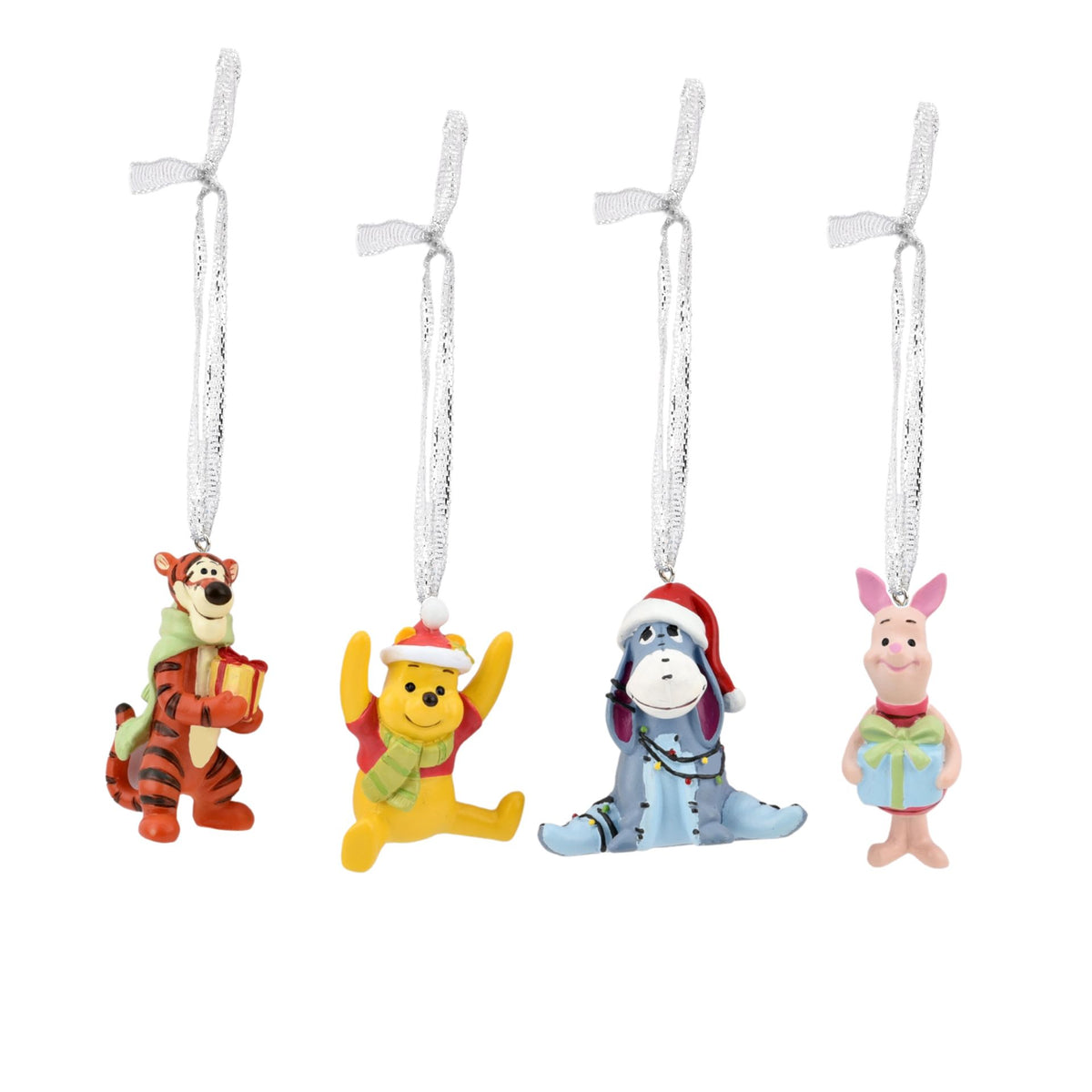 Set of four resin character ornaments: Tigger, Pooh, Eeyore, and Piglet with silver loops